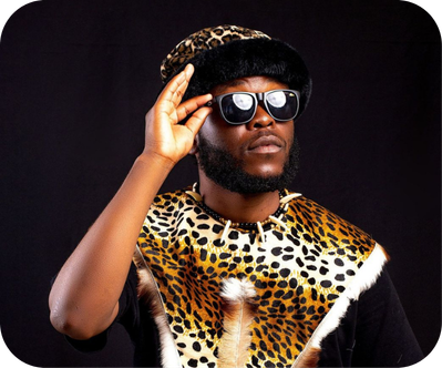 Fab G Mshanakagogo wearing a leopard print top and sunglasses